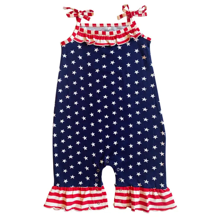 Children's romper with star pattern and red checkered top on a white background