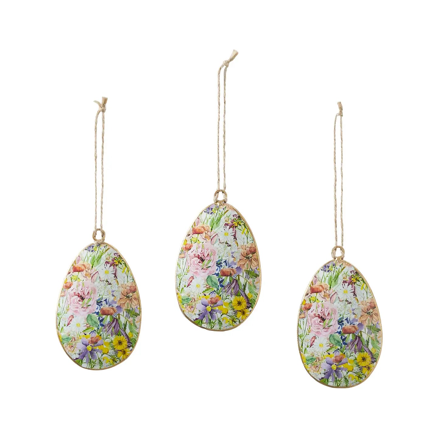 Three floral hanging decorations on a white background