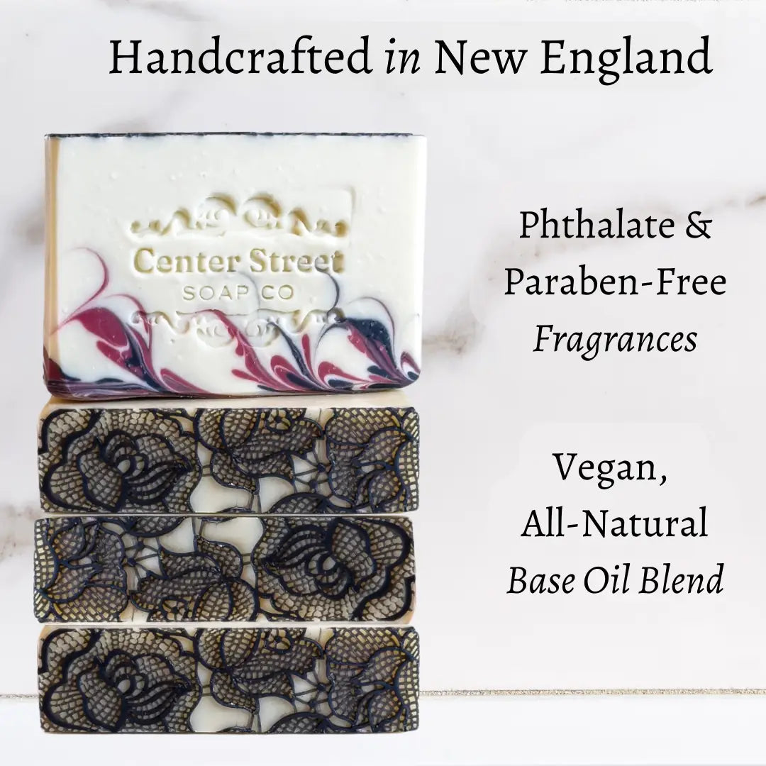 Three bars of soap with floral designs and 'Center Street Soap Co' branding, on a white background with text about product features.