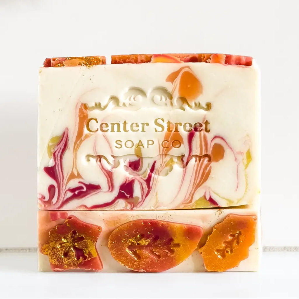 Bar of soap with marbled design and 'Center Street Soap Co' branding on a white background
