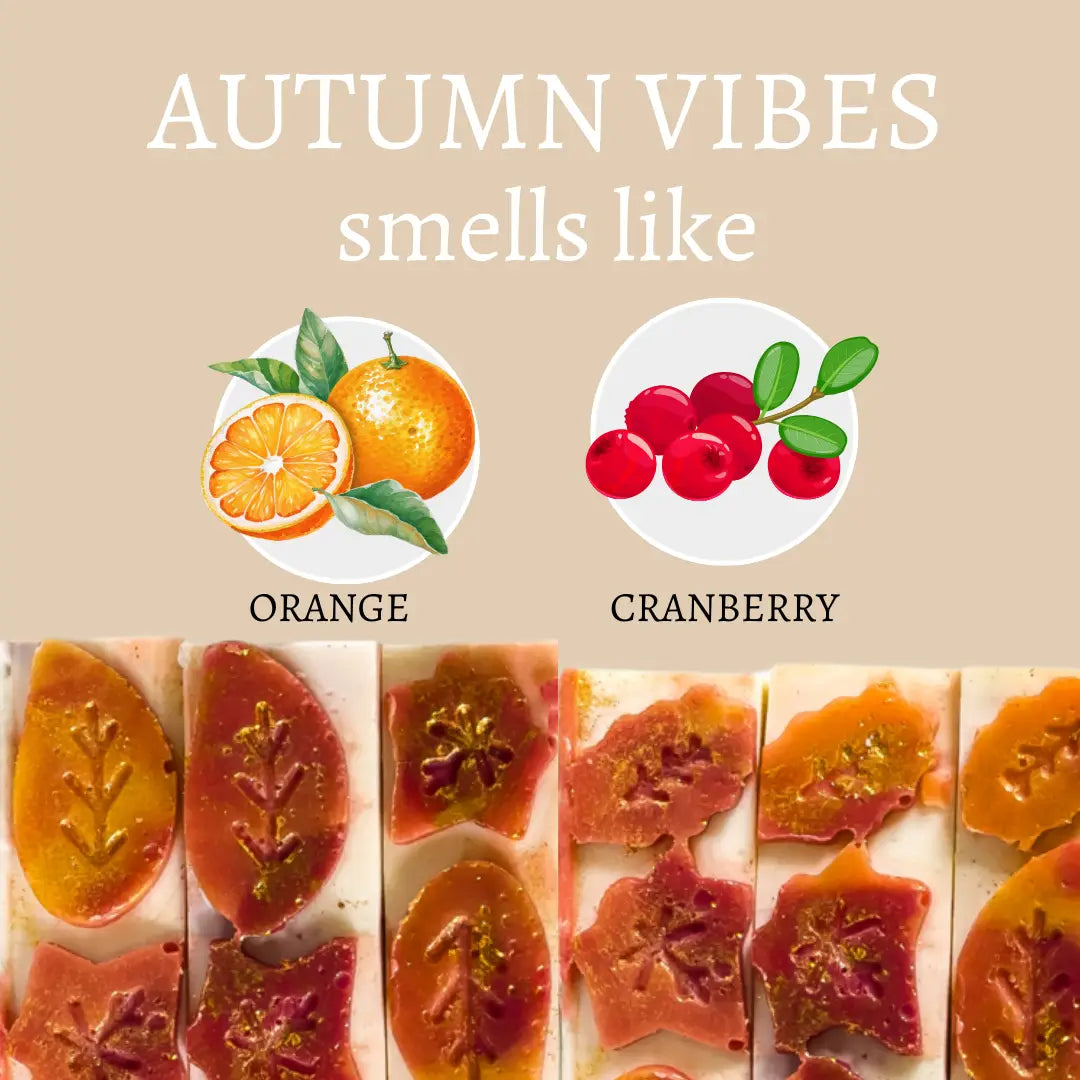 Decorative soap bars with autumn-themed design elements on a beige background.