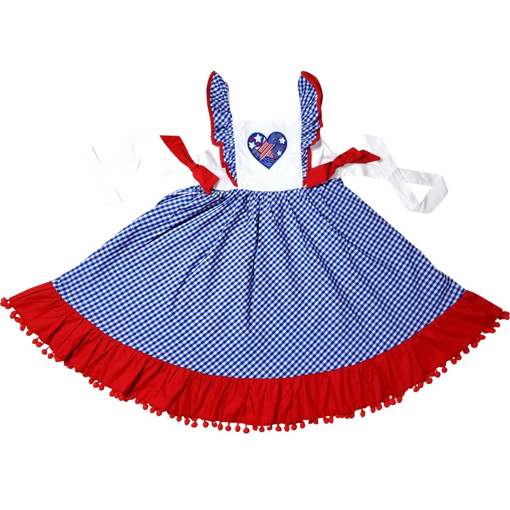 Children's dress with blue checkered skirt and red trim on a white background