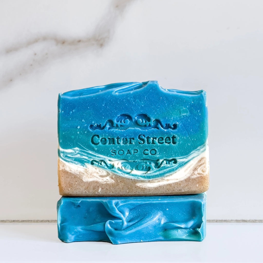 Blue and beige soap bar with 'Center Street Soap Co' branding on a light background