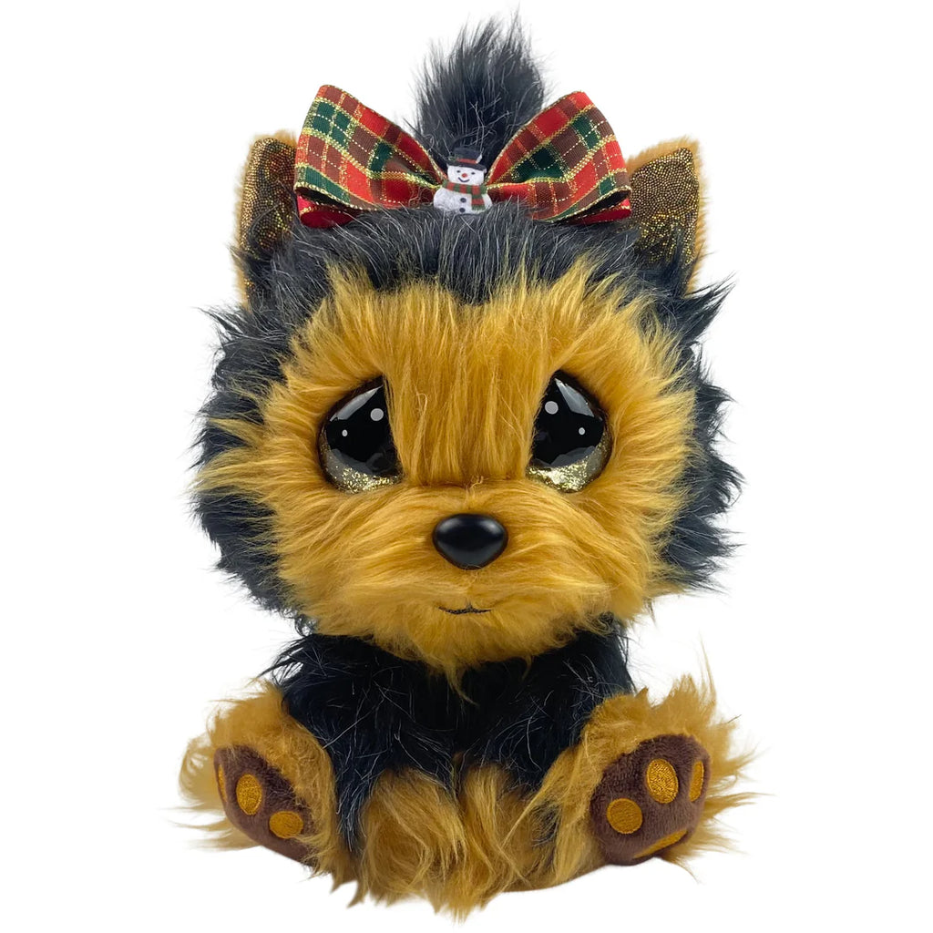 Plush toy dog with a bow on a white background