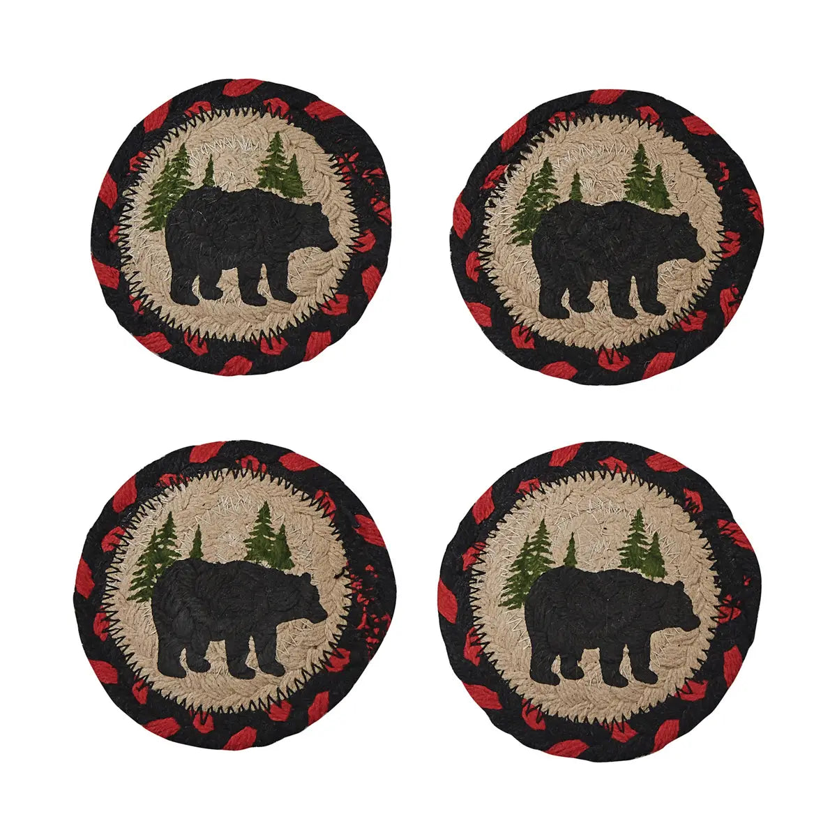 Four round coasters with bear and tree design on a white background