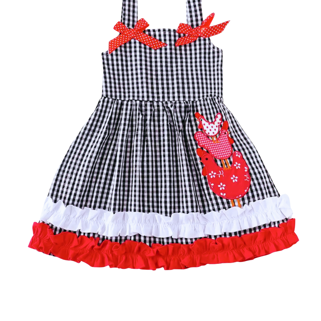 Black and white checkered dress with red accents and a fox design on a white background