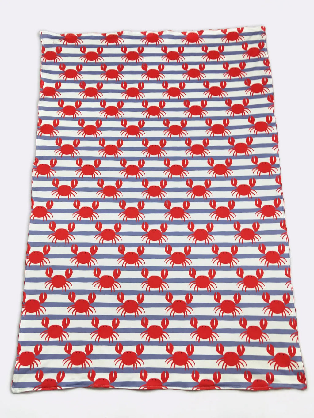Fabric with red crab pattern on blue and white striped background