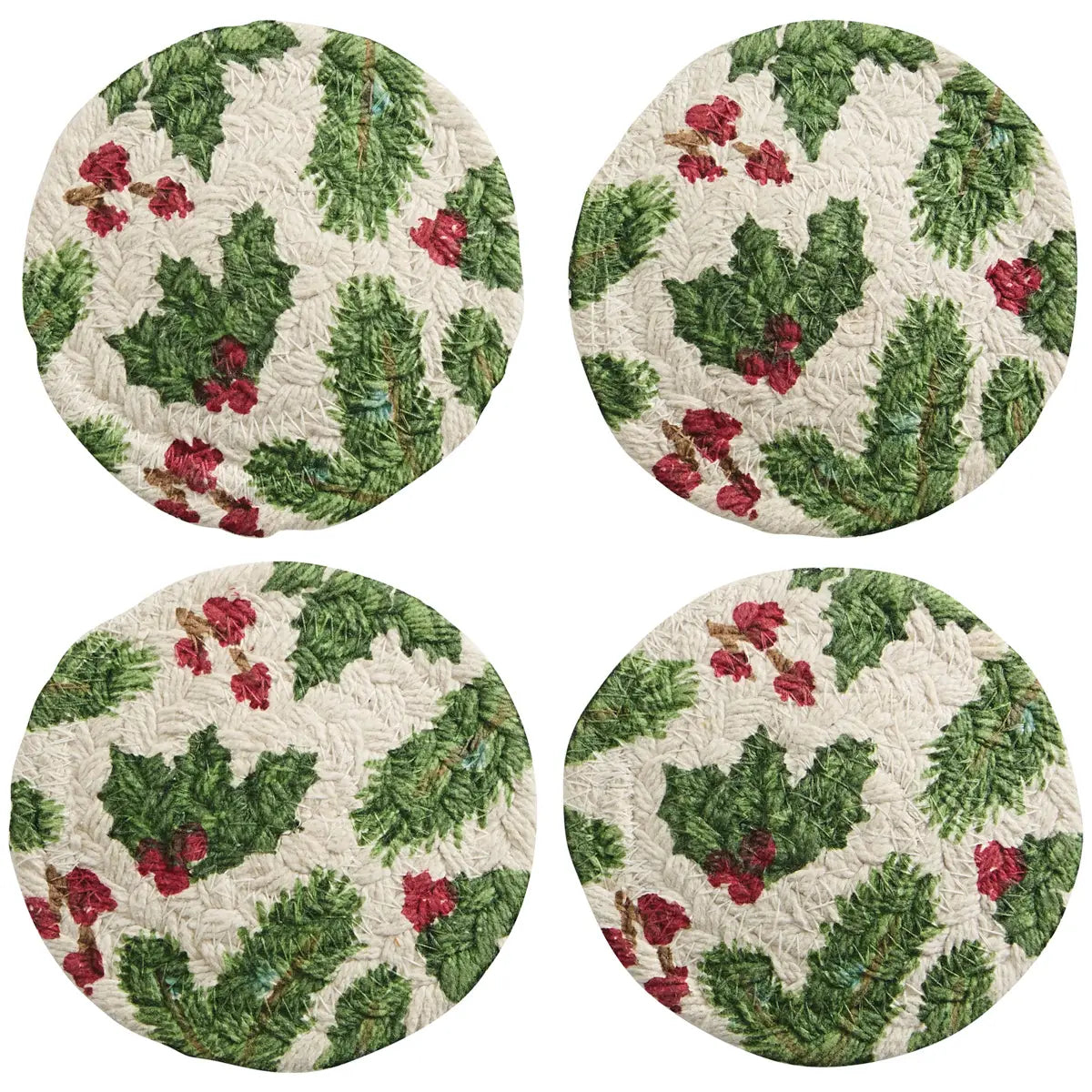 Four round coasters with holly leaf and berry pattern on a white background