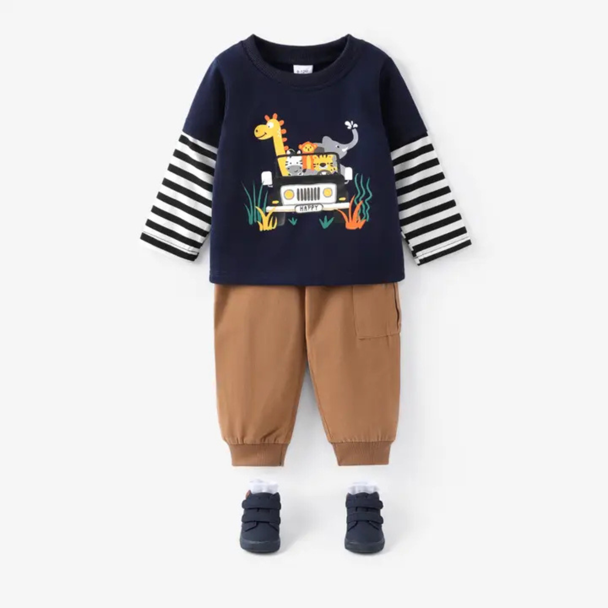 Children's outfit with navy sweater, brown pants, and black shoes on a white background