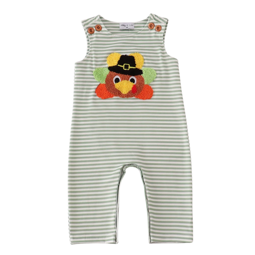 Striped baby romper with a turkey design on a white background