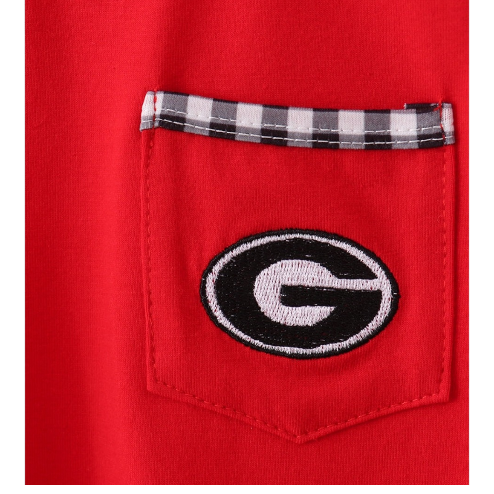 Red shirt pocket with a checkered interior and embroidered logo on a white background