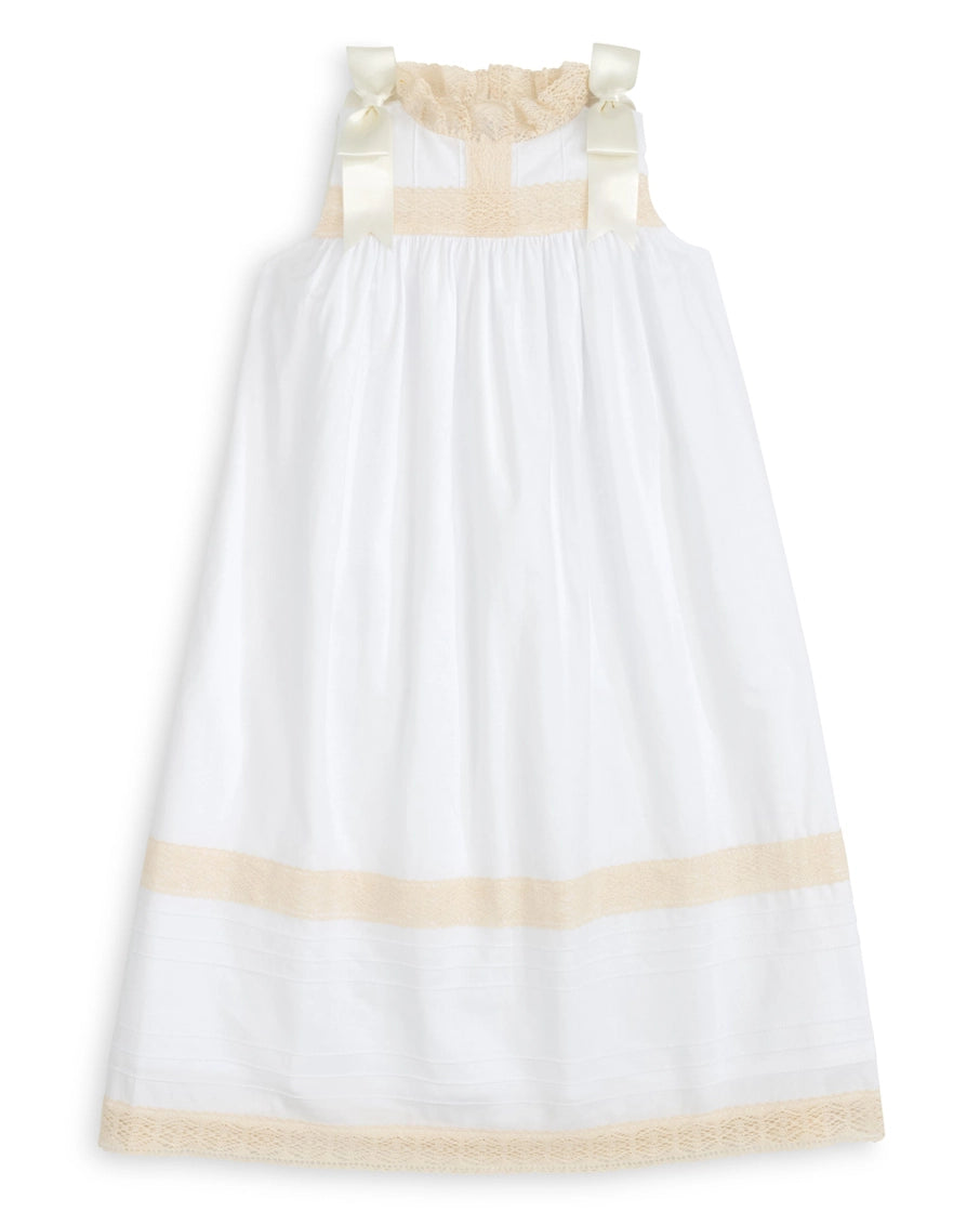 White dress with beige accents on a white background
