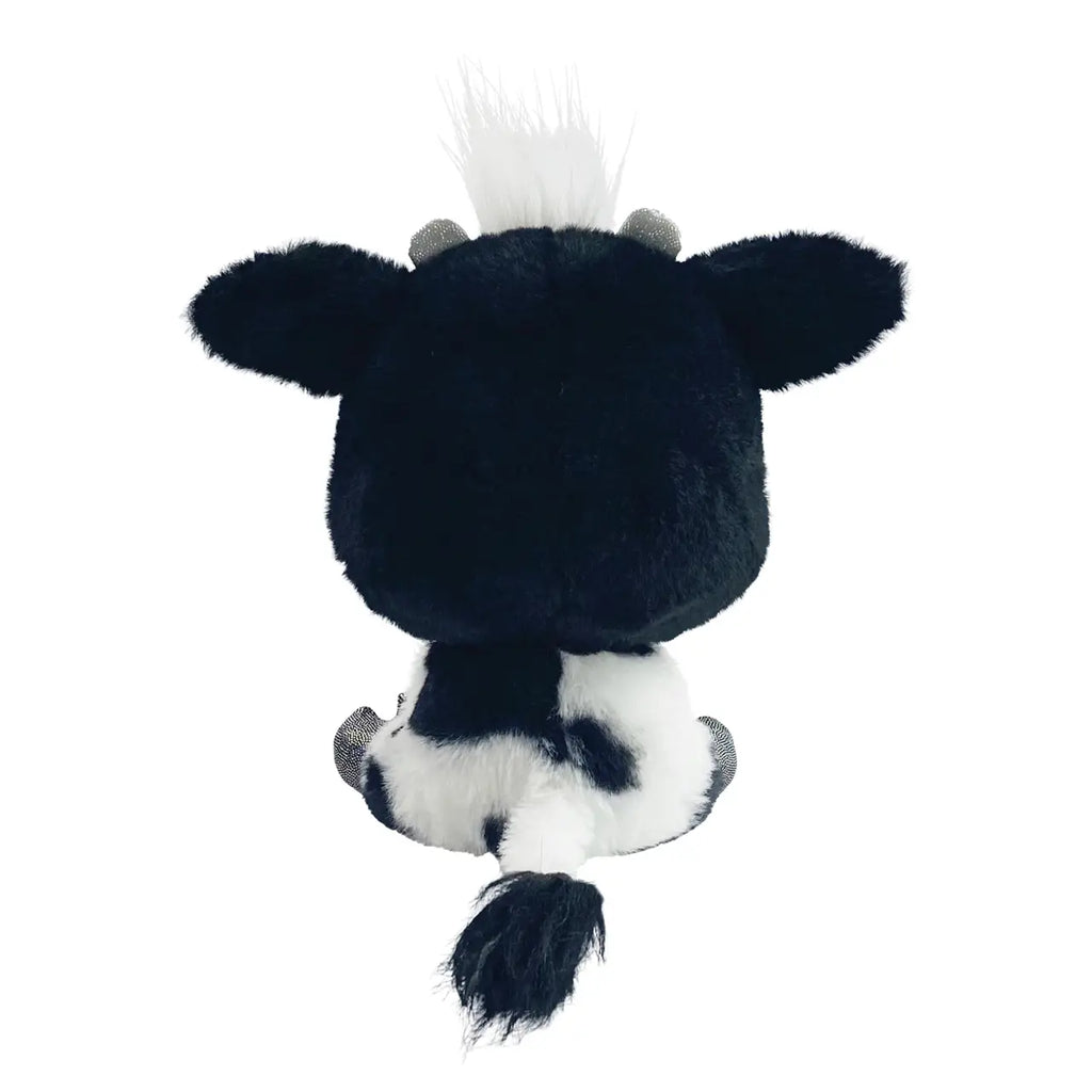 Plush toy cow on a white background