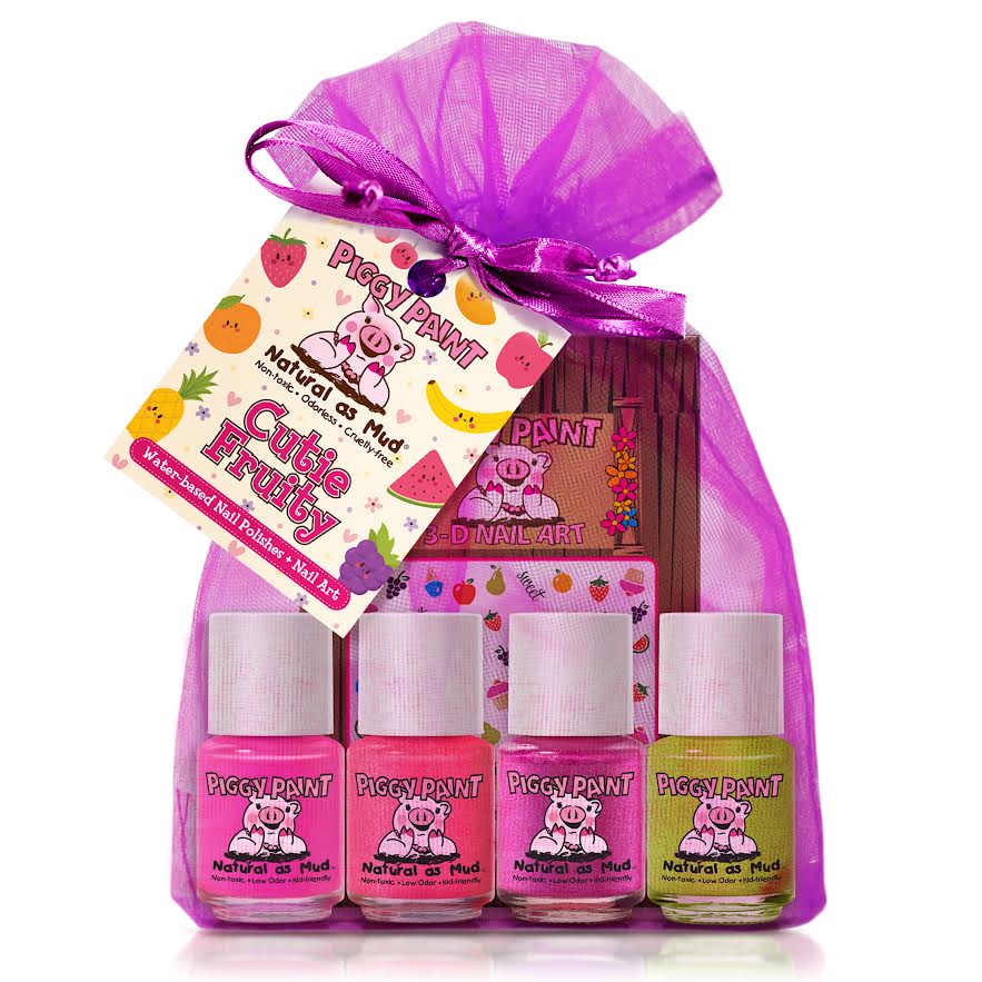 Piggy Paint nail polish set in a pink gift bag with a purple bow on a white background.