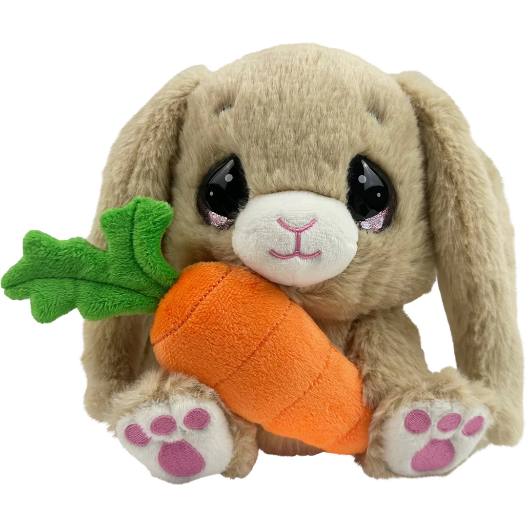 Plush toy rabbit holding a carrot on a white background