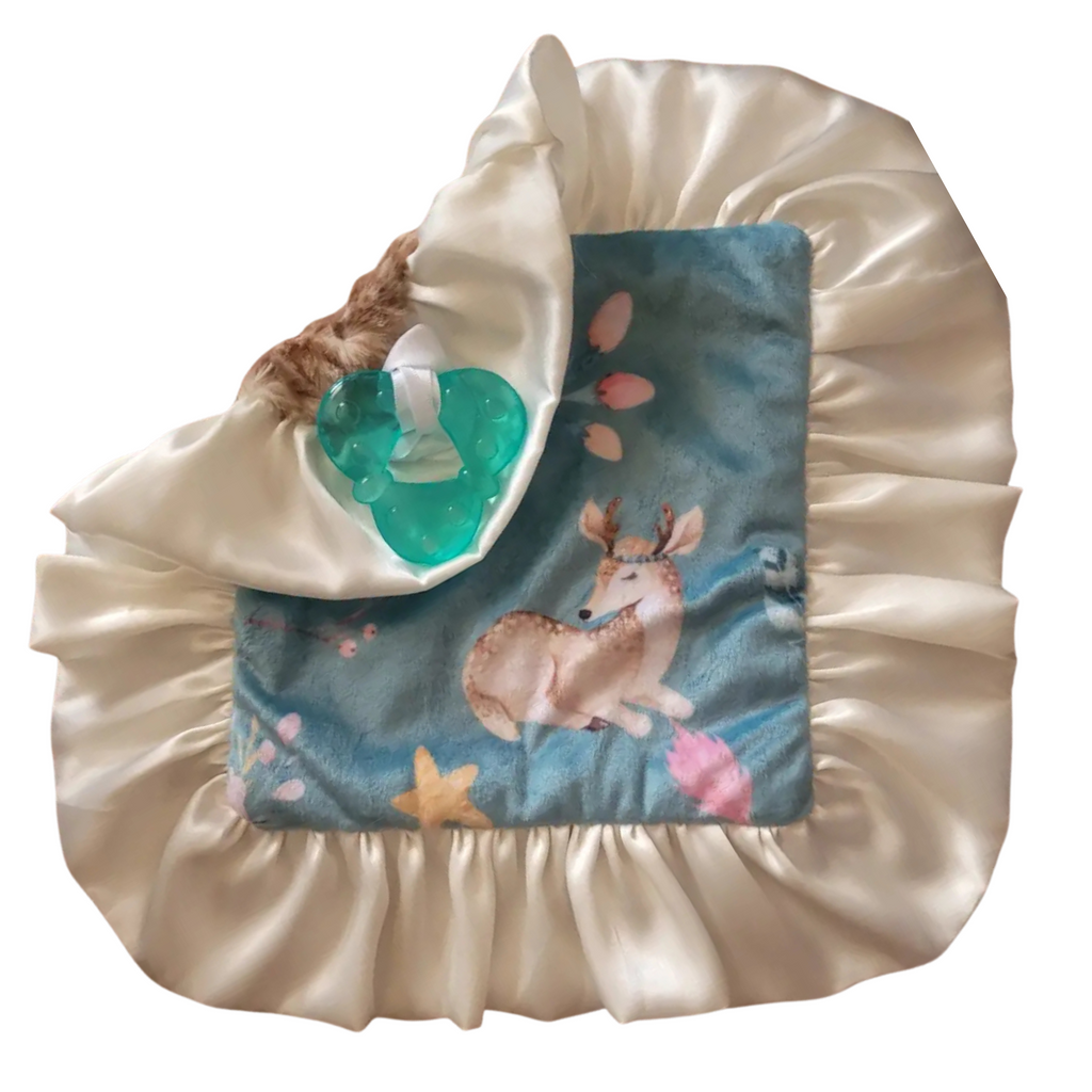 Baby comfort blanket with deer design and pacifier in a satin case on a white background