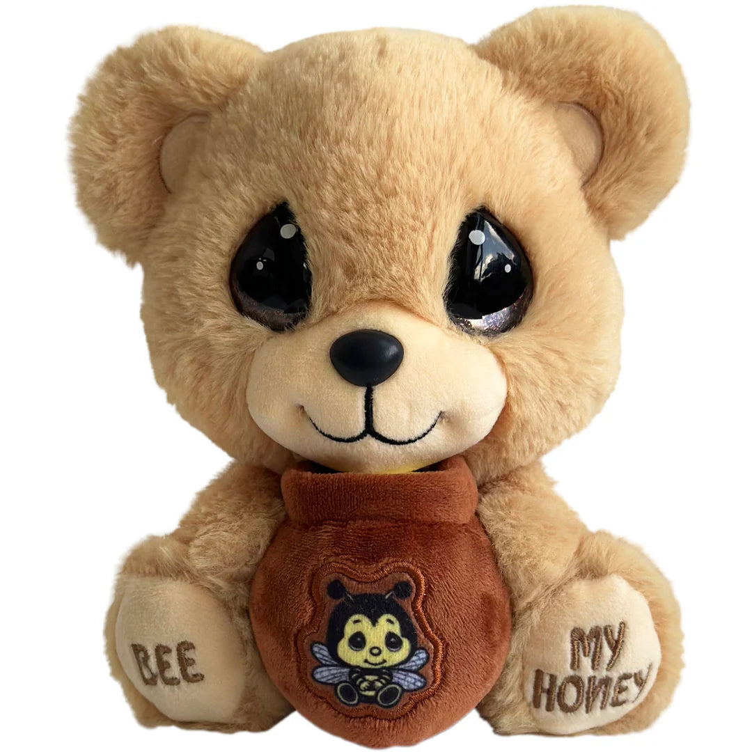 Plush bear toy with a honey jar and bee design on a white background