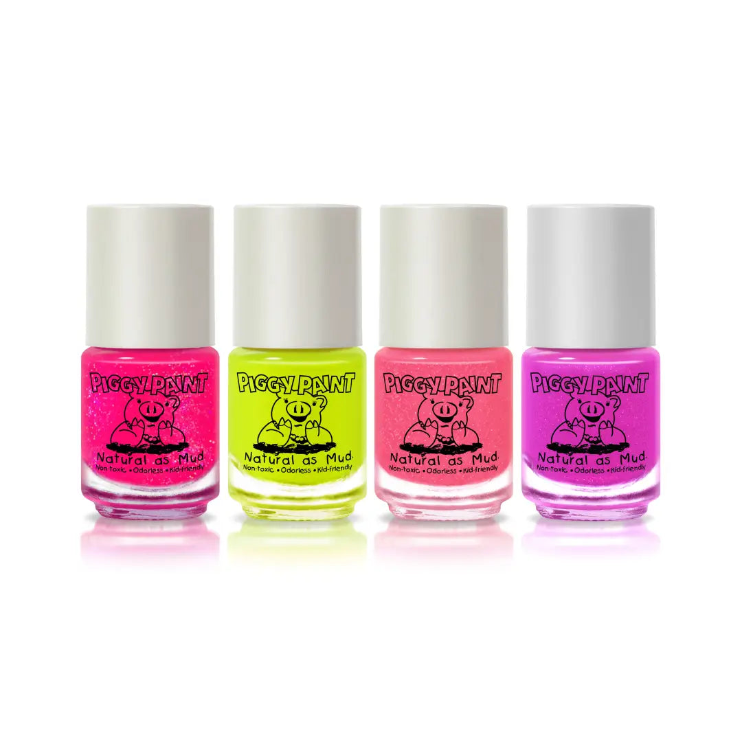 Four bottles of Piggy Paint nail polish in pink, yellow, and red on a white background