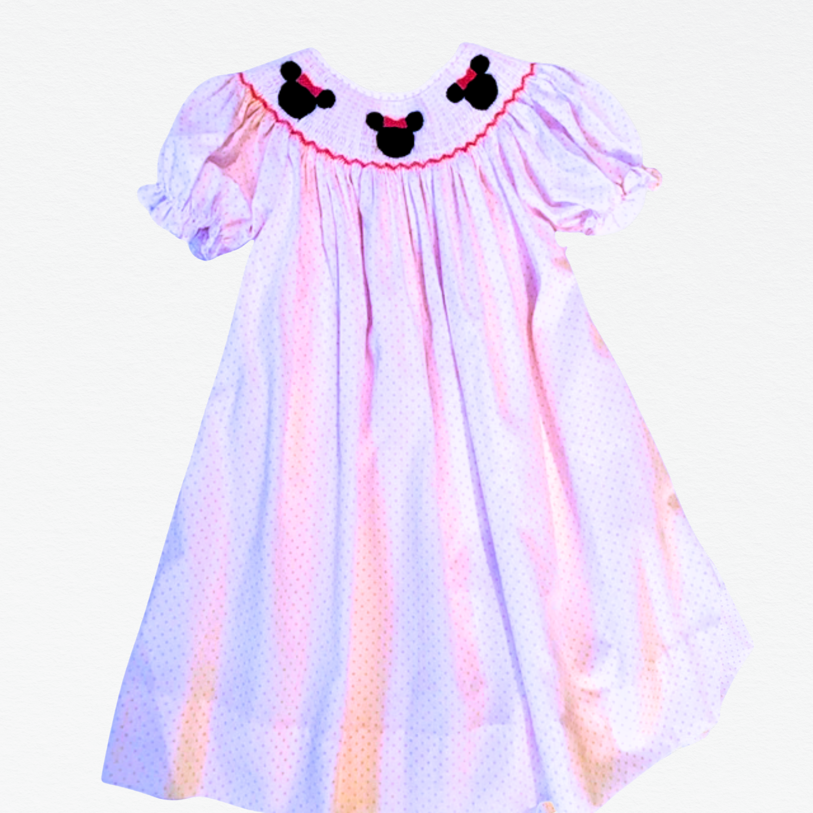 Children's bishop dress with Minnie Mouse ears on a white background