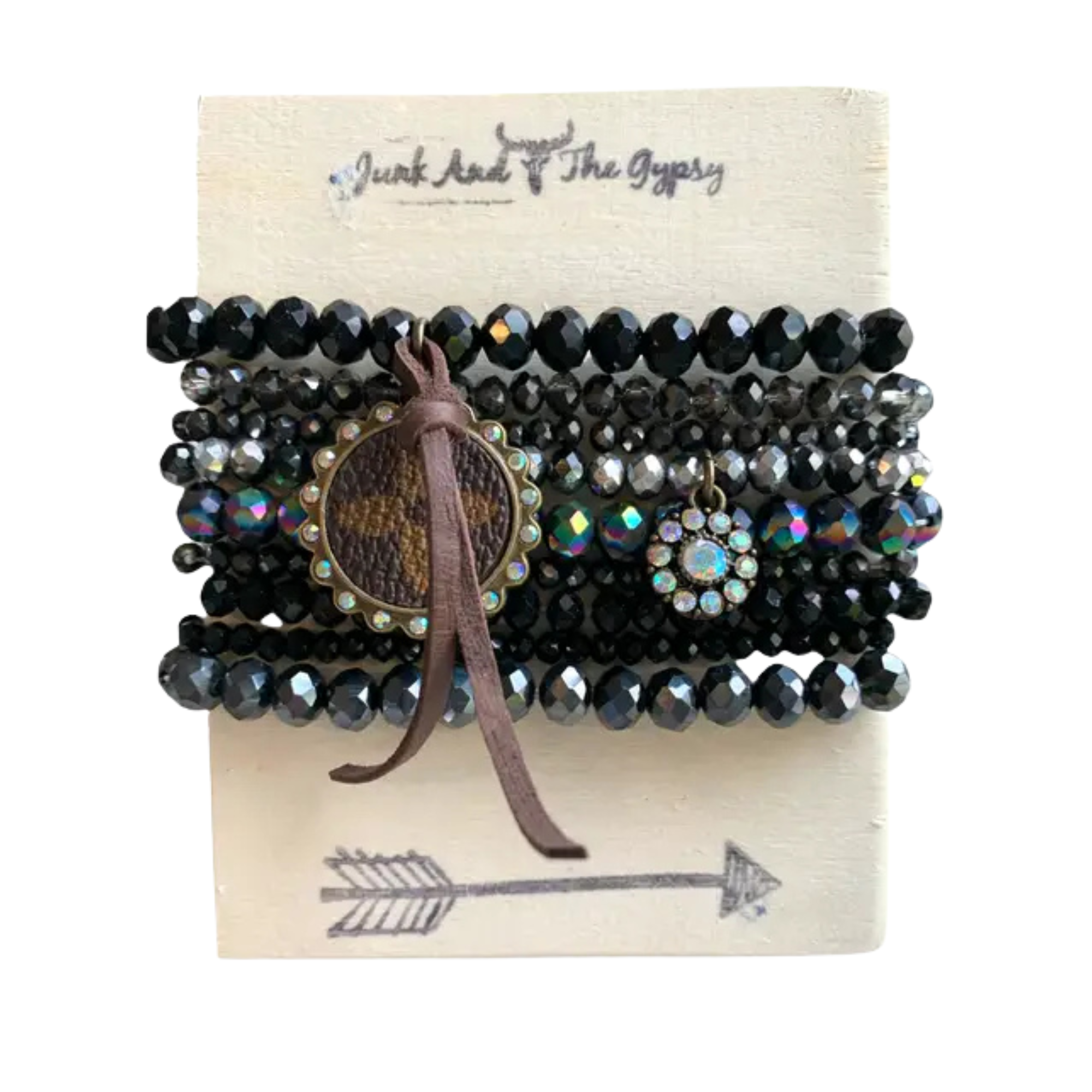 Set of beaded bracelets with a leather accent on a branded card.