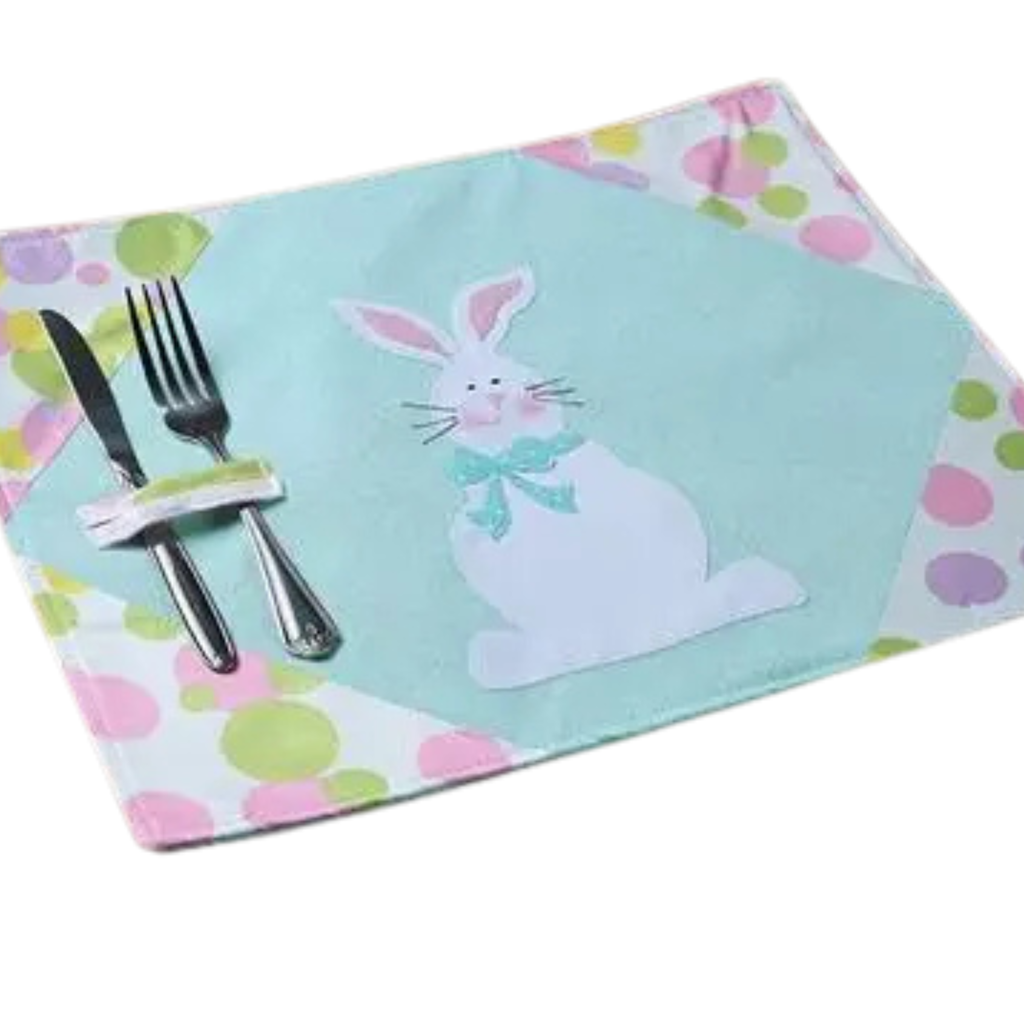 Placemat with bunny design and cutlery holder on a white background