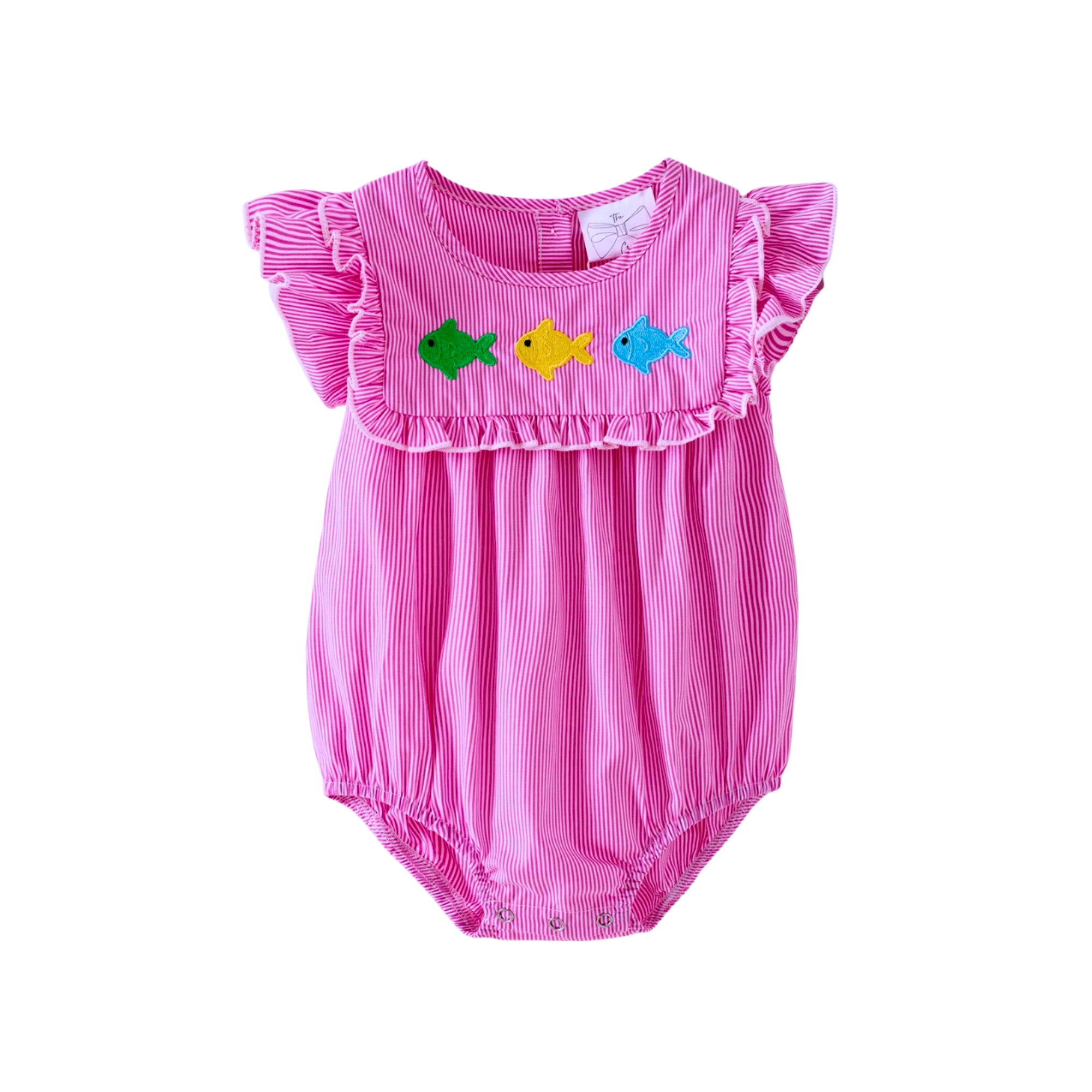 Pink baby romper with fish designs on a white background