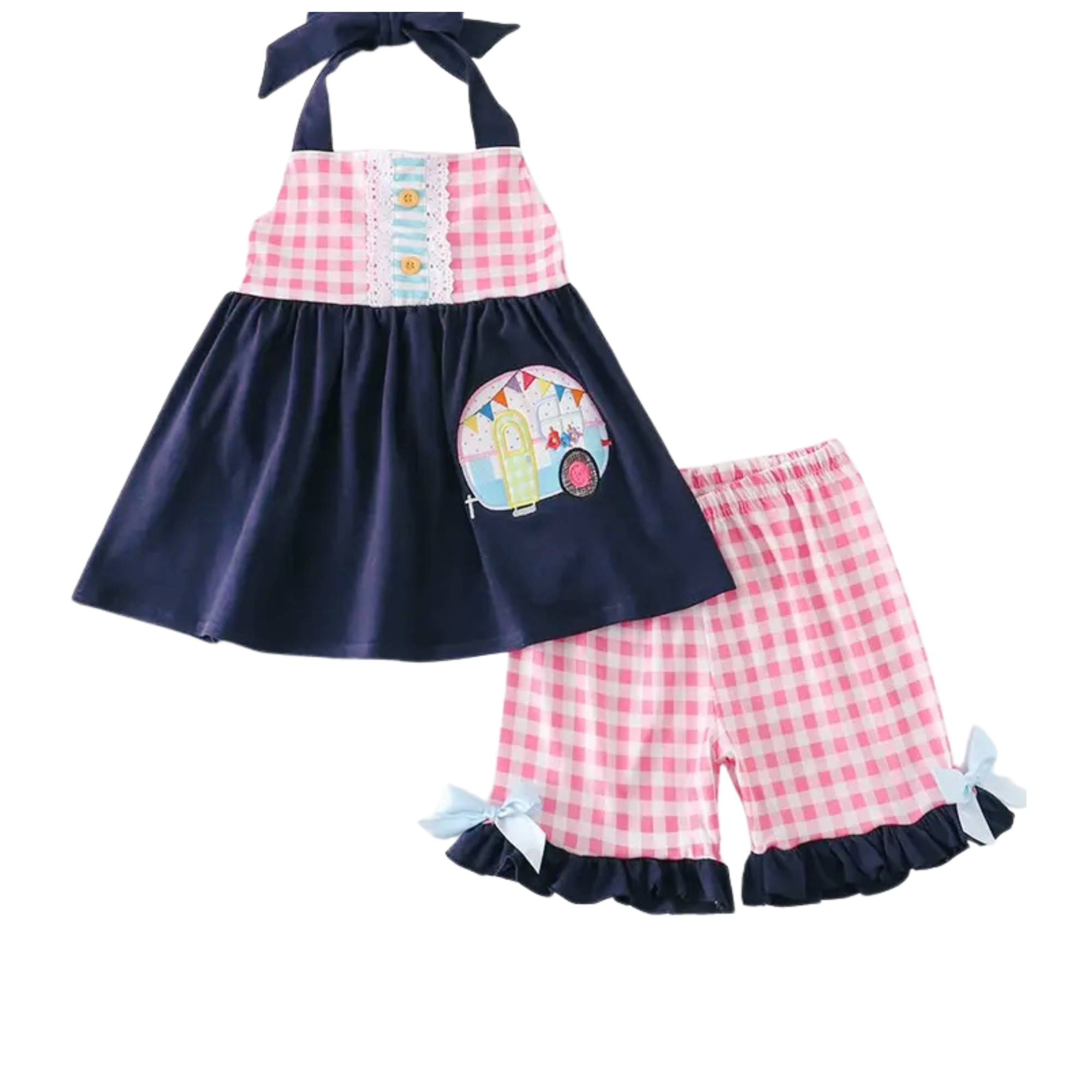 Children's outfit with navy dress and pink checkered shorts on a white background