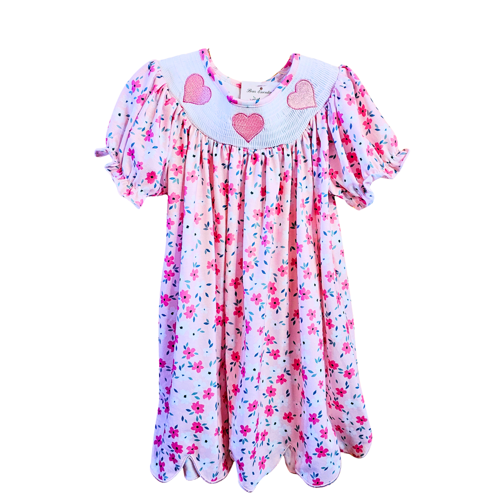 Floral dress with heart designs on a white background