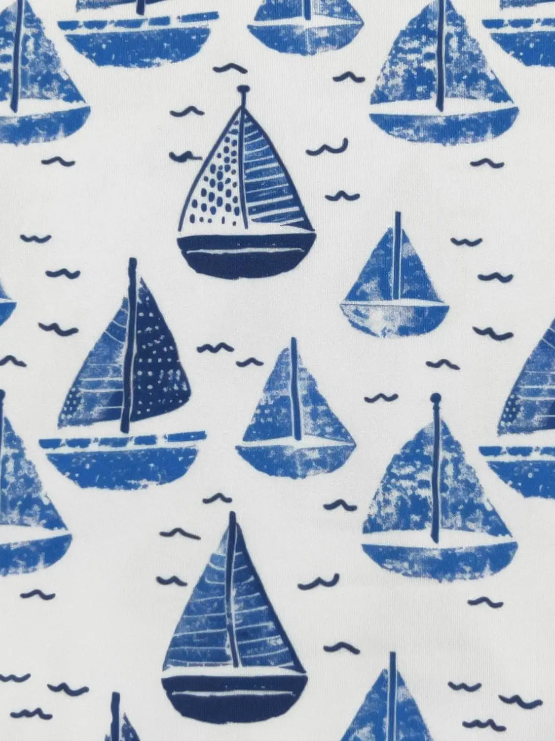 Pattern of blue sailboats on a white background
