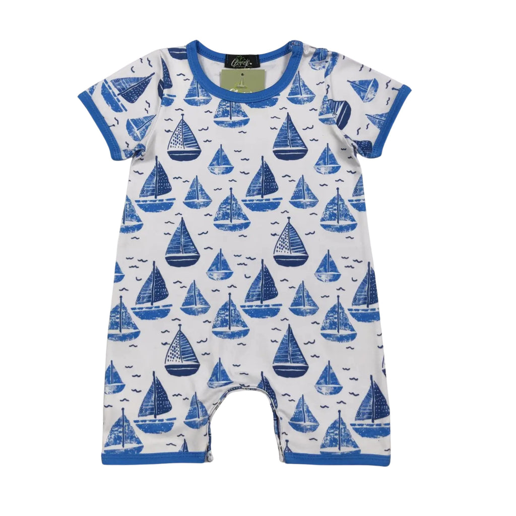 Baby romper with blue sailboat pattern on a white background
