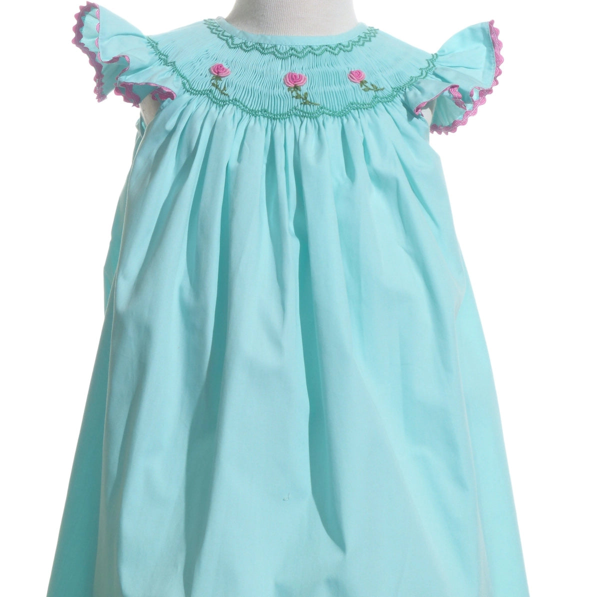 Light blue dress with floral embroidery on a white background