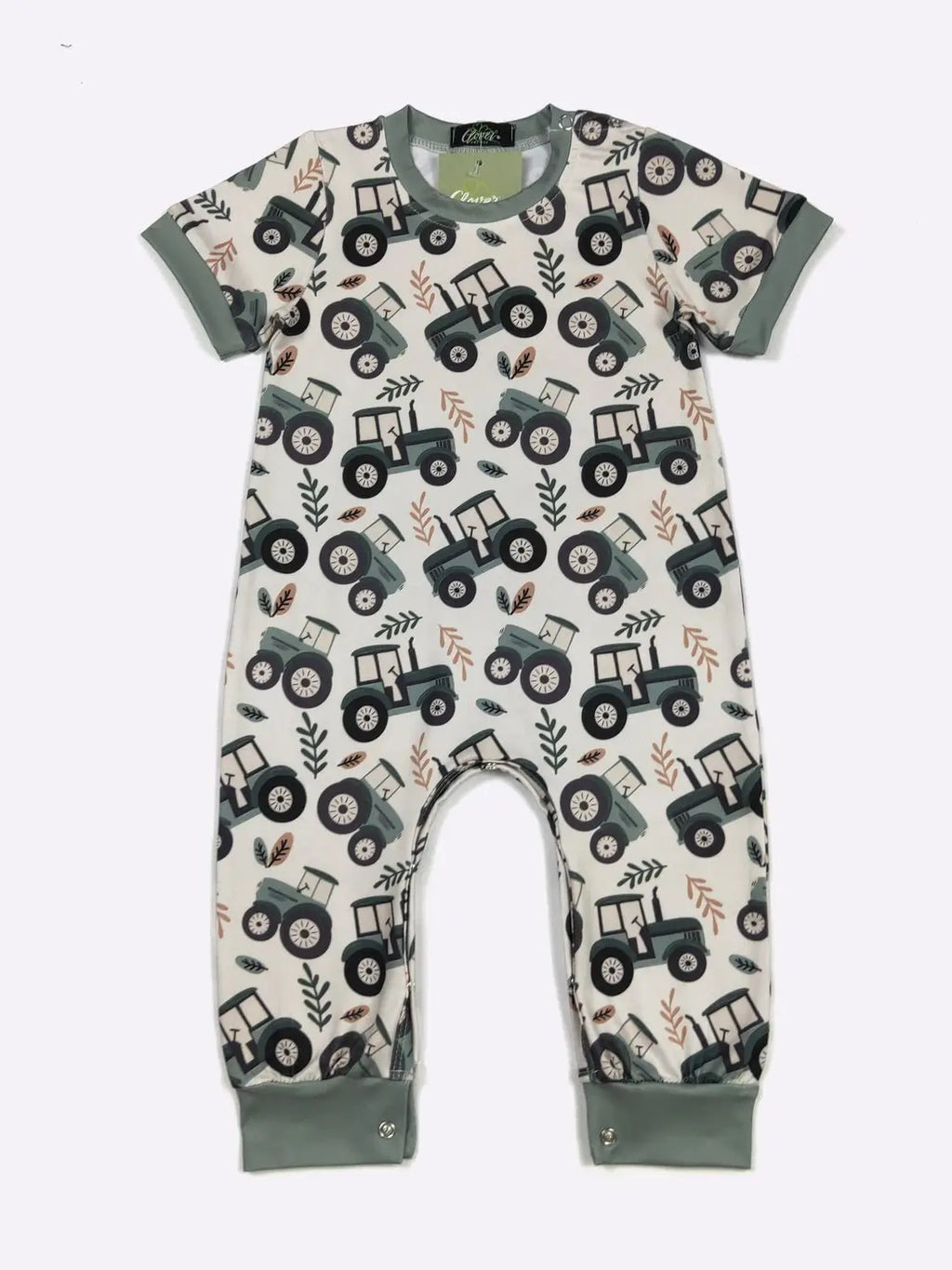 Children's onesie with tractor pattern on a white background