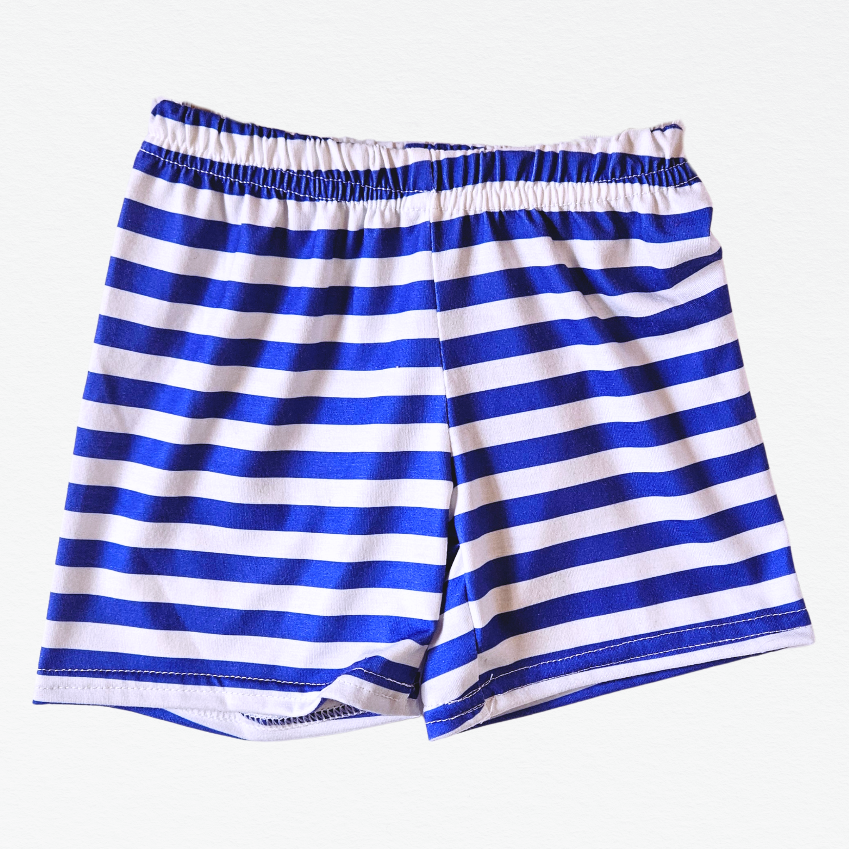 Blue and white striped shorts on a white background