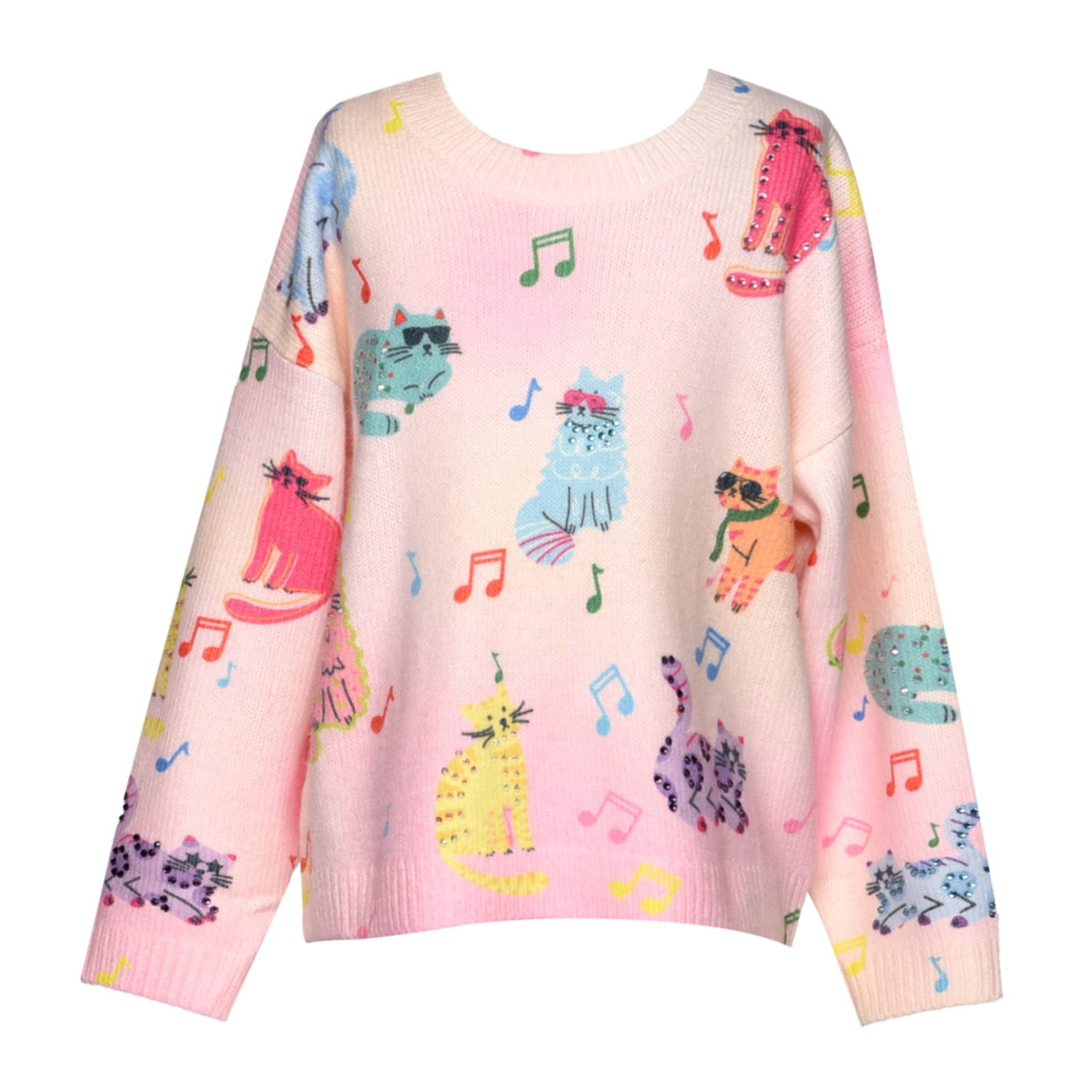 Pink sweater with colorful cat and music note patterns on a white background