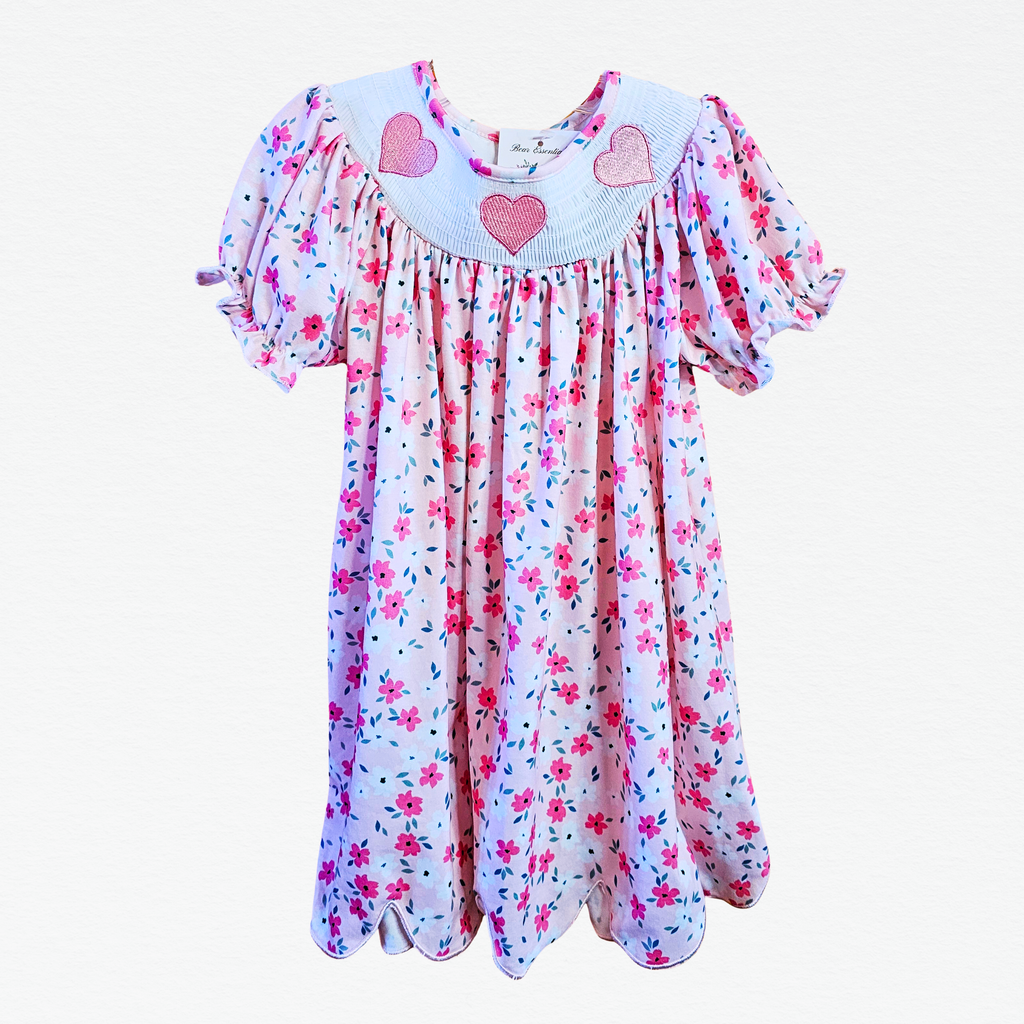 Floral dress with heart patterns on a white background