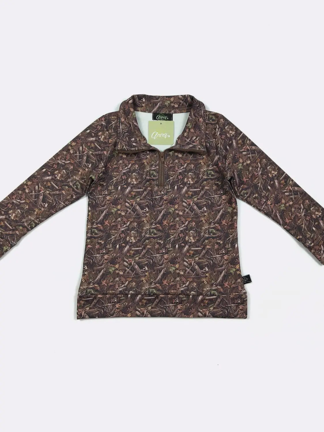 Brown patterned pullover on a light gray background