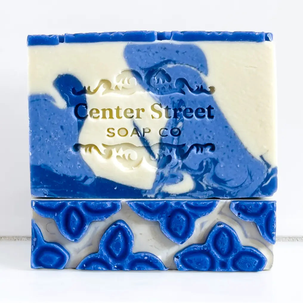 Blue and white soap bar with 'Center Street Soap Co' branding on a light background