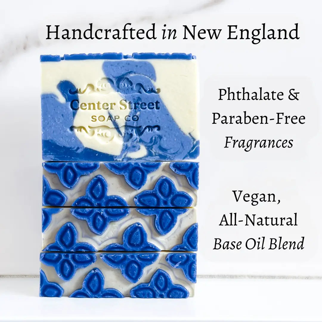 Handcrafted soap bar with blue and white design on a white background, featuring Center Street Soap Co branding.