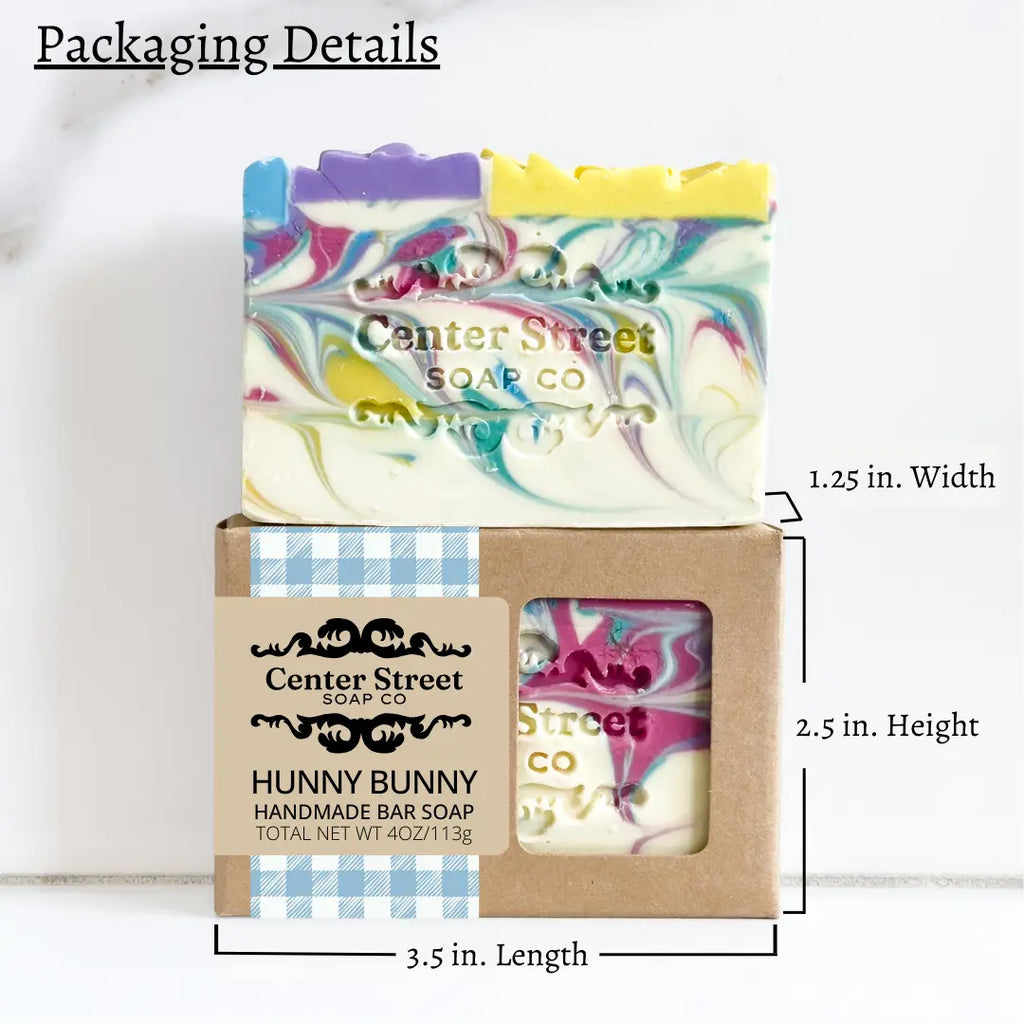 Colorful soap bar with 'Center Street Soap Co' branding in a cardboard box, with dimensions displayed.