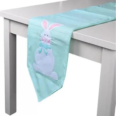 Table runner with a bunny design on a white table