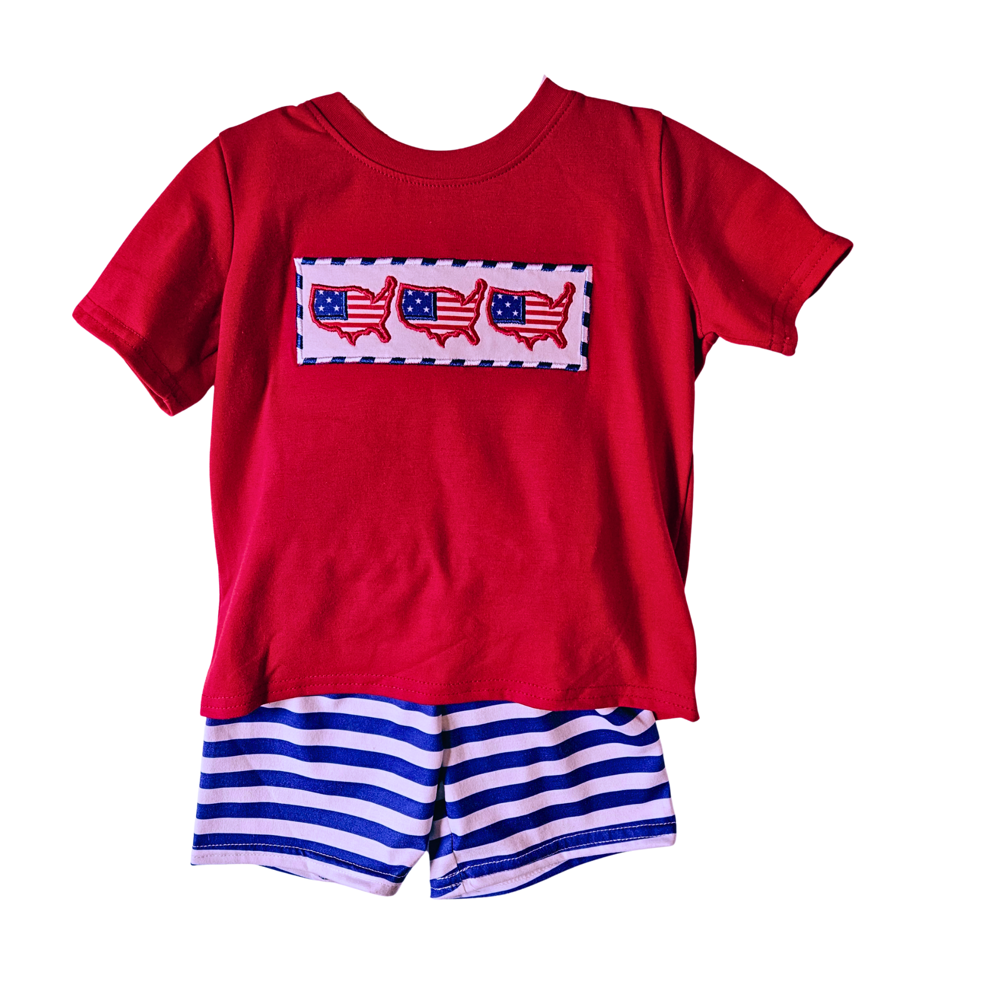 Red t-shirt with American flag design and blue striped shorts on a white background